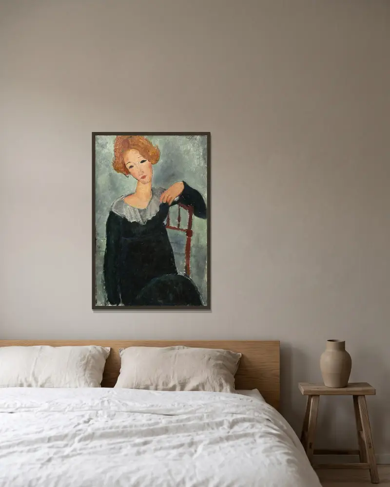 Kvinna med rött hår av Amedeo Modigliani inramad på en vägg