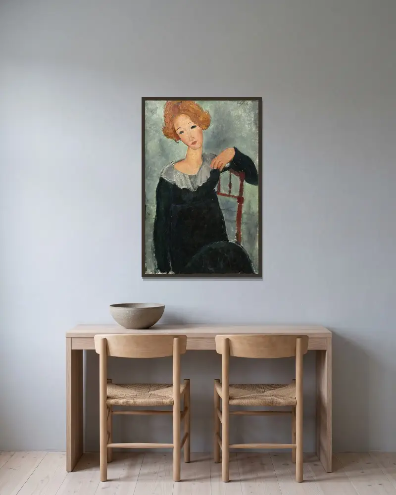 Kvinna med rött hår av Amedeo Modigliani inramad på en vägg