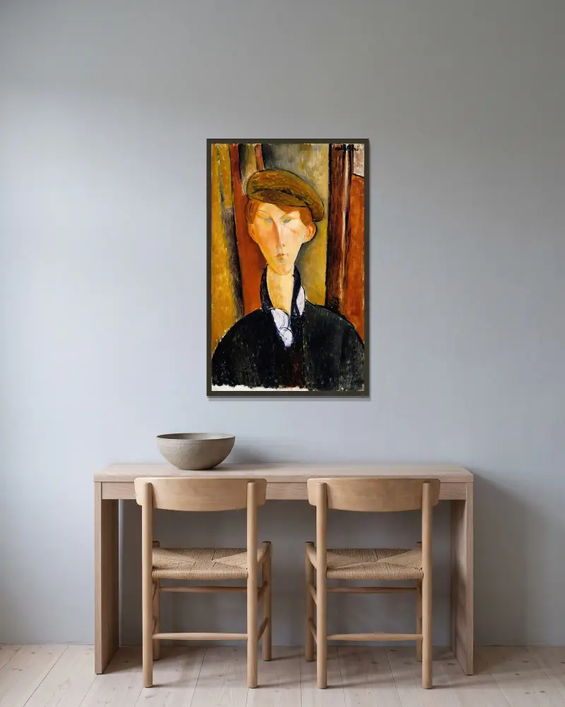 Young Man with a Cap av Amedeo Modigliani inramad på en vägg