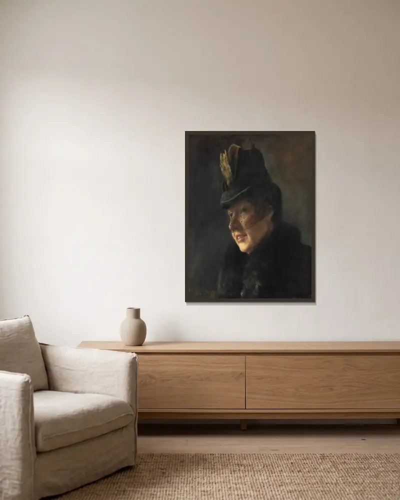 Porträtt av en ung kvinna i kappa med pälskrage och hatt med slöja av Laurits Andersen Ring inramad på en vägg
