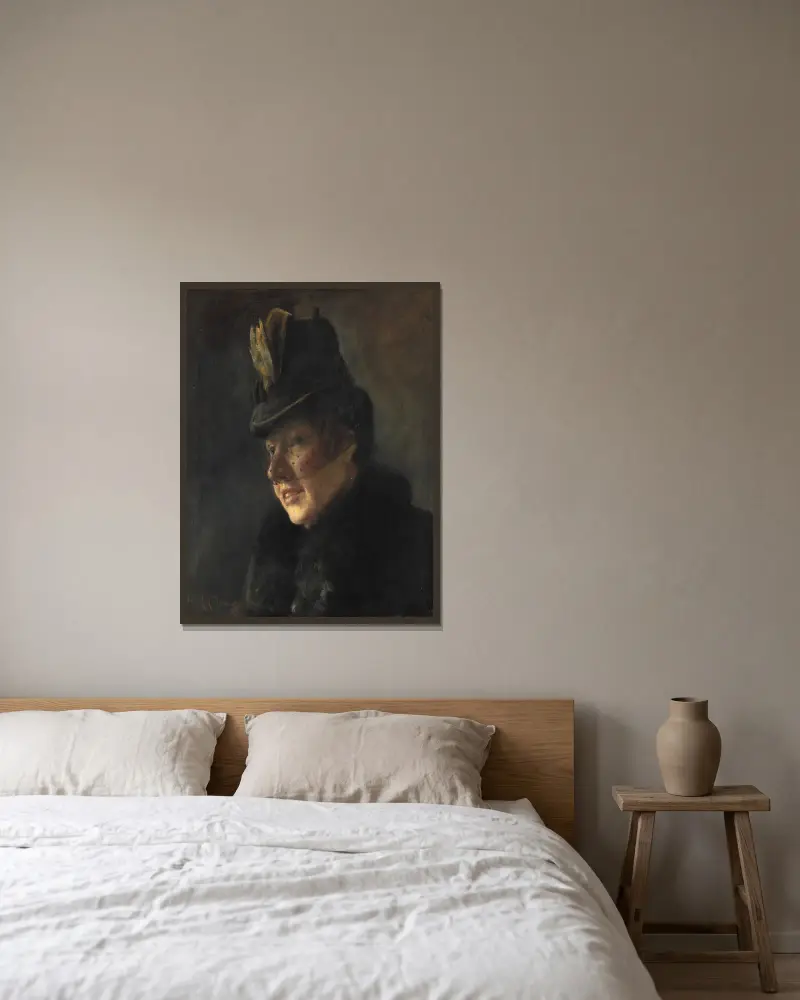 Porträtt av en ung kvinna i kappa med pälskrage och hatt med slöja av Laurits Andersen Ring inramad på en vägg