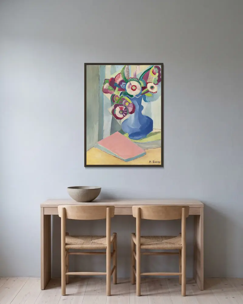Stilleben med blomvas av Ángel Zárraga inramad på en vägg