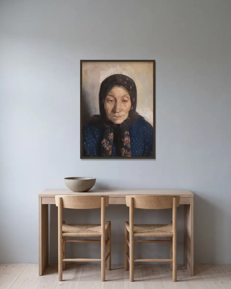En gammal fiskares hustru av Anna Ancher inramad på en vägg