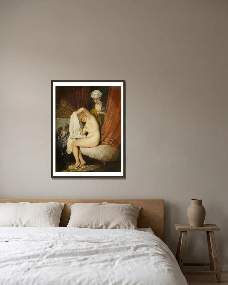 Kvinna vid sin toalett av Jean-Antoine Watteau inramad på en vägg