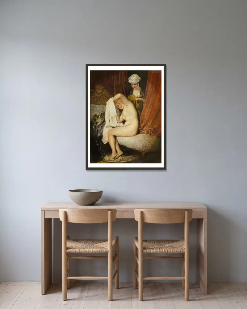 Kvinna vid sin toalett av Jean-Antoine Watteau inramad på en vägg