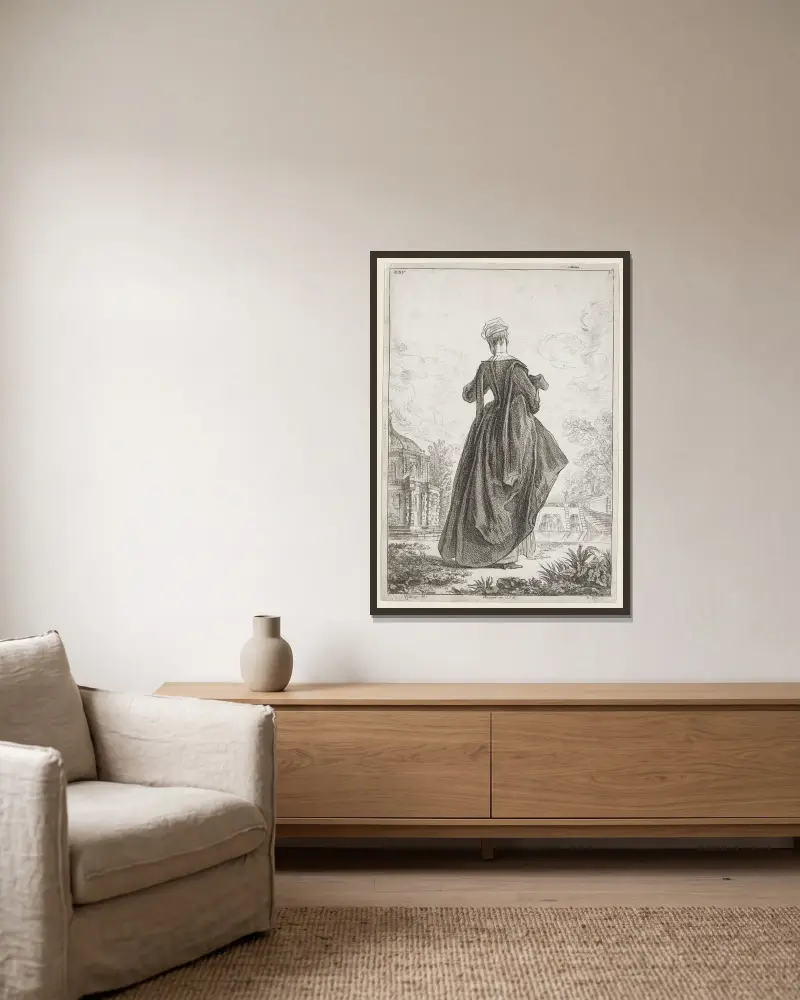 Kostymplansch XXV av Jean-Antoine Watteau inramad på en vägg