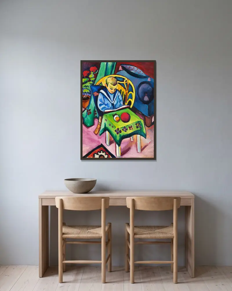 Junge mit Buch und Spielsachen von August Macke gerahmt an einer Wand
