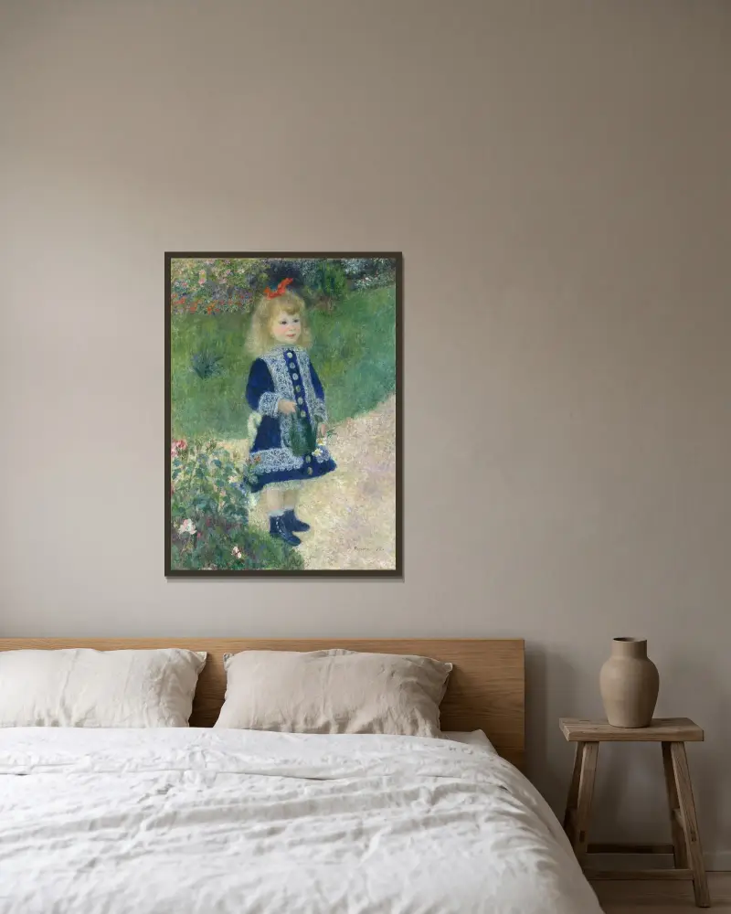 Mädchen mit Gießkanne von Pierre-Auguste Renoir gerahmt an einer Wand