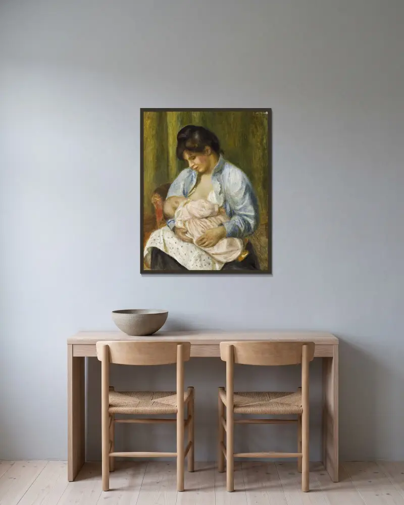 Kvinna som ammar ett barn av Pierre-Auguste Renoir inramad på en vägg
