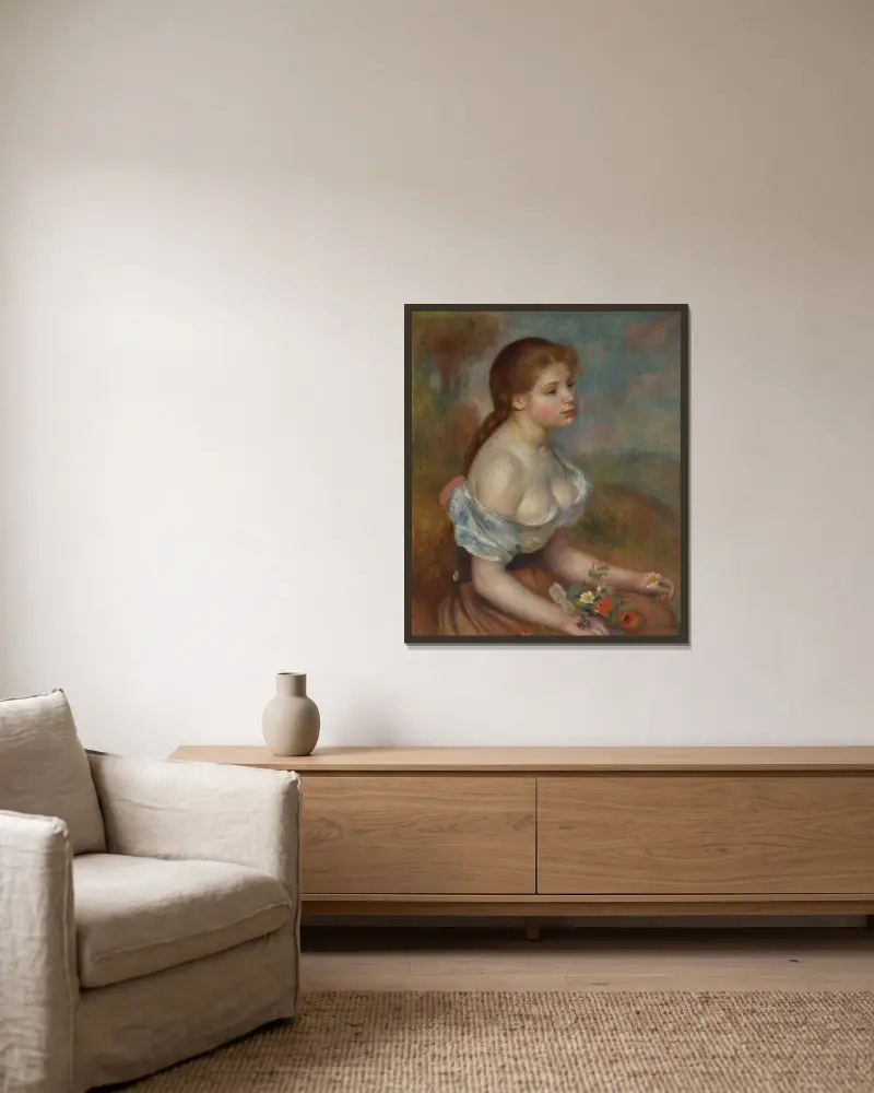 Ung flicka med prästkragar av Pierre-Auguste Renoir inramad på en vägg