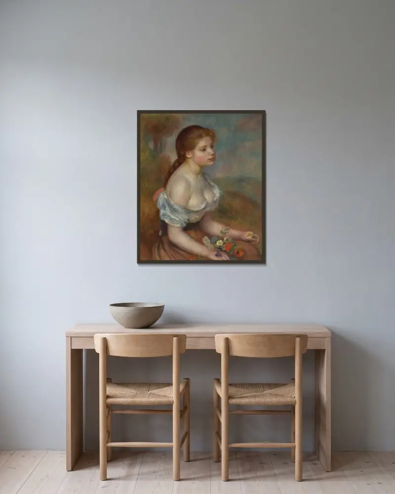 Ung flicka med prästkragar av Pierre-Auguste Renoir inramad på en vägg