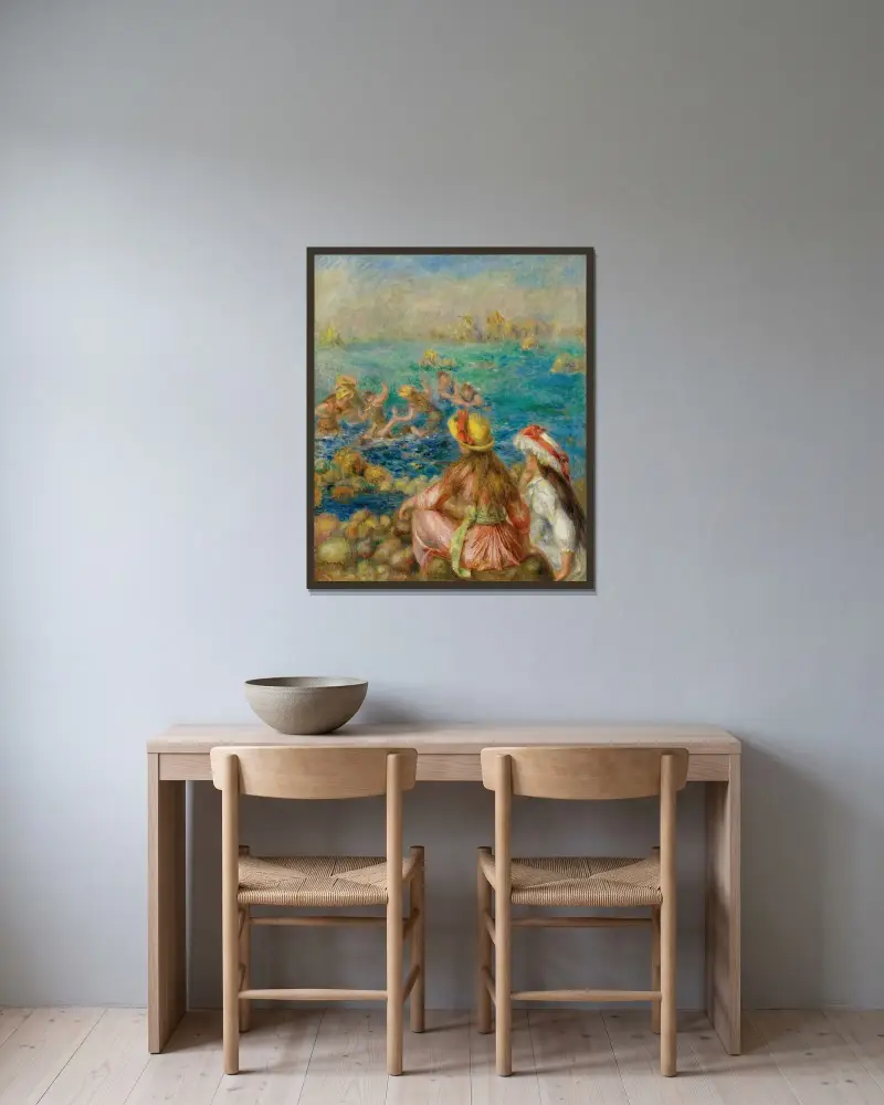 Badande kvinnor av Pierre-Auguste Renoir inramad på en vägg