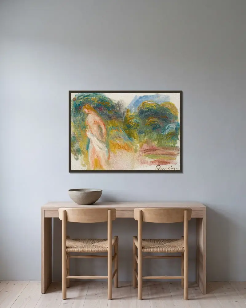 Naken kvinna och landskap av Pierre-Auguste Renoir inramad på en vägg