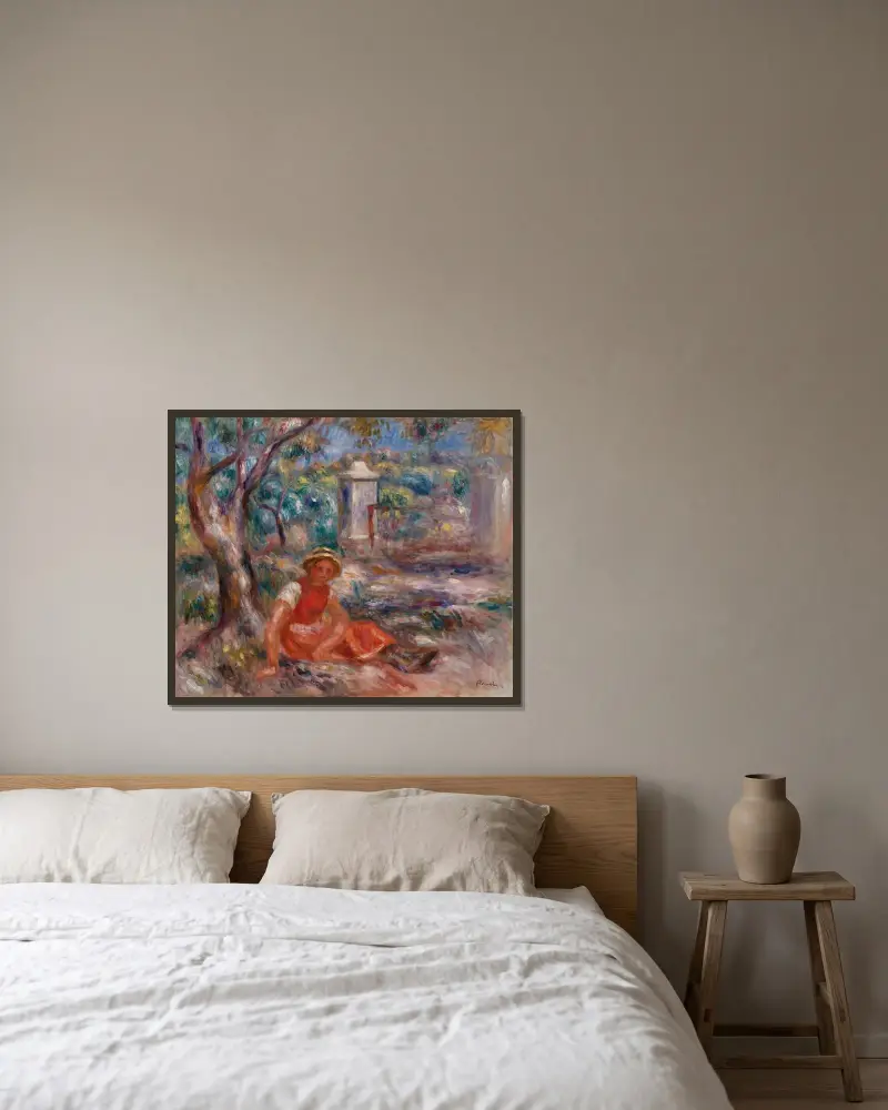 Flicka vid foten av ett träd av Pierre-Auguste Renoir inramad på en vägg