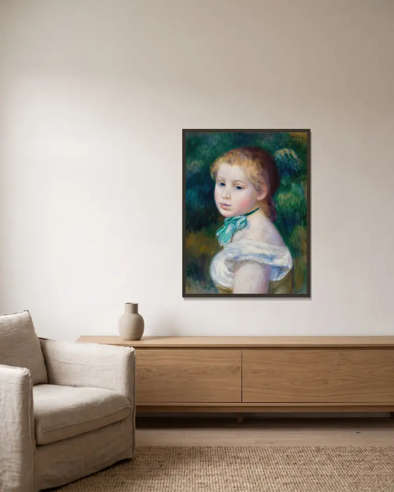 Mädchenkopf (Tête de jeune fille) von Pierre-Auguste Renoir gerahmt an einer Wand
