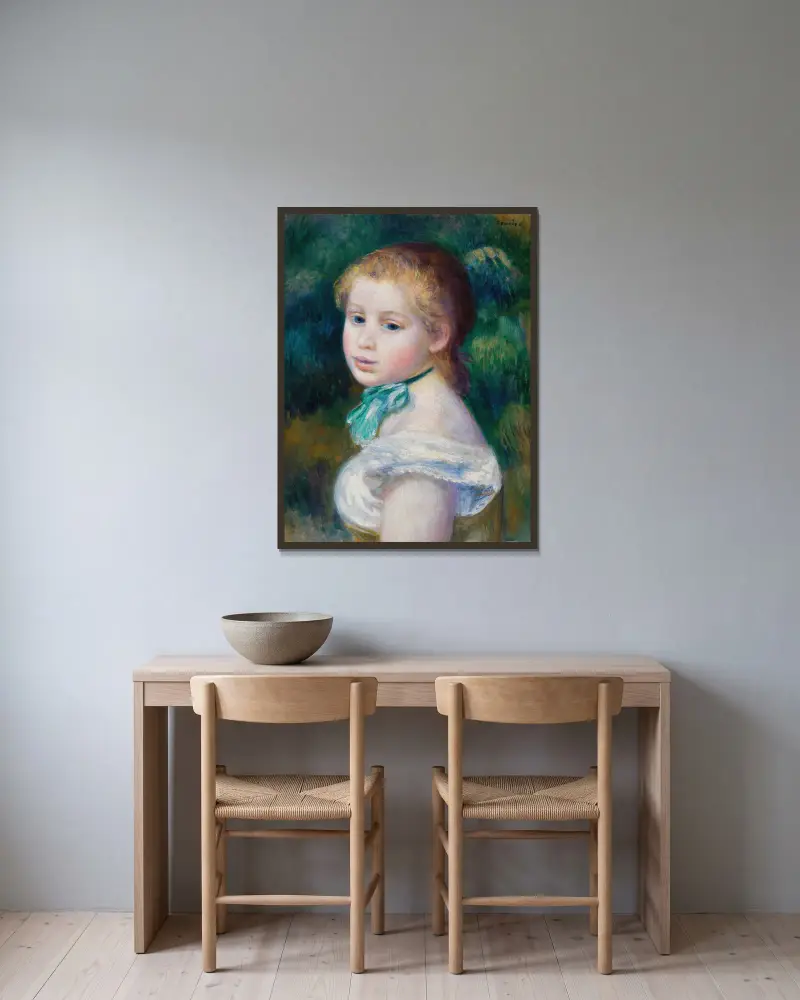 Mädchenkopf (Tête de jeune fille) von Pierre-Auguste Renoir gerahmt an einer Wand