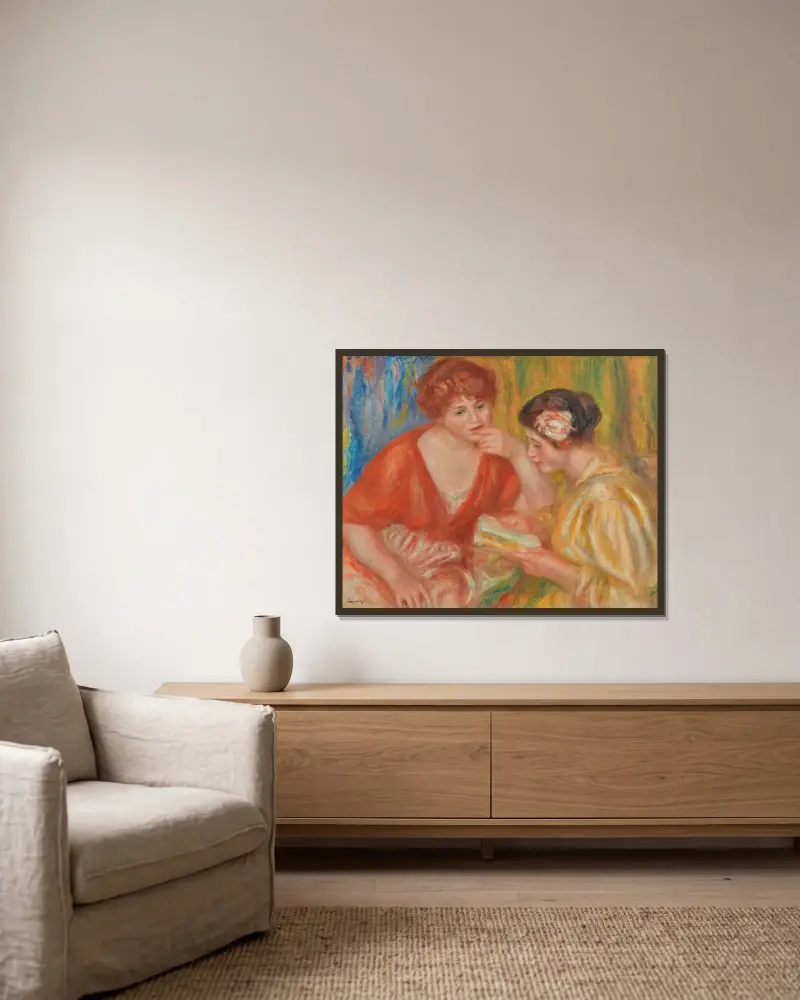Die Lektüre, zwei Frauen in roten und rosa Blusen von Pierre-Auguste Renoir gerahmt an einer Wand