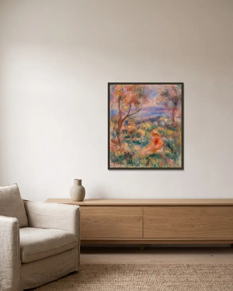 Sittande kvinna vid havet av Pierre-Auguste Renoir inramad på en vägg