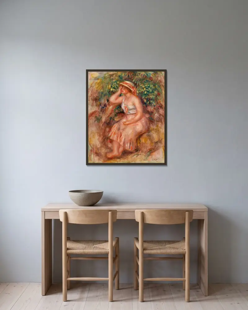 Drömmerskan av Pierre-Auguste Renoir inramad på en vägg