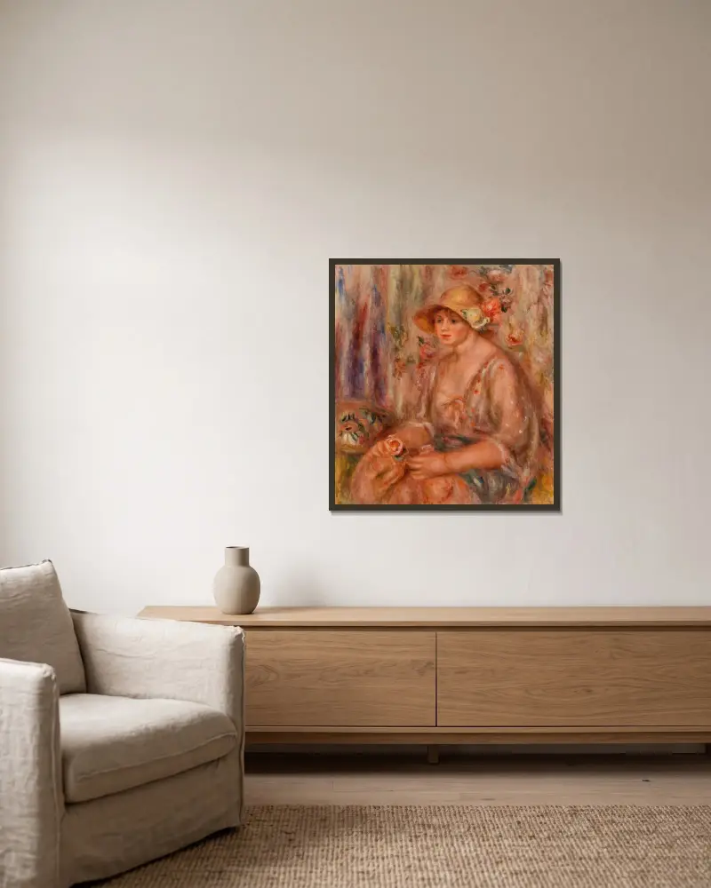 Kvinna i muslinklänning av Pierre-Auguste Renoir inramad på en vägg