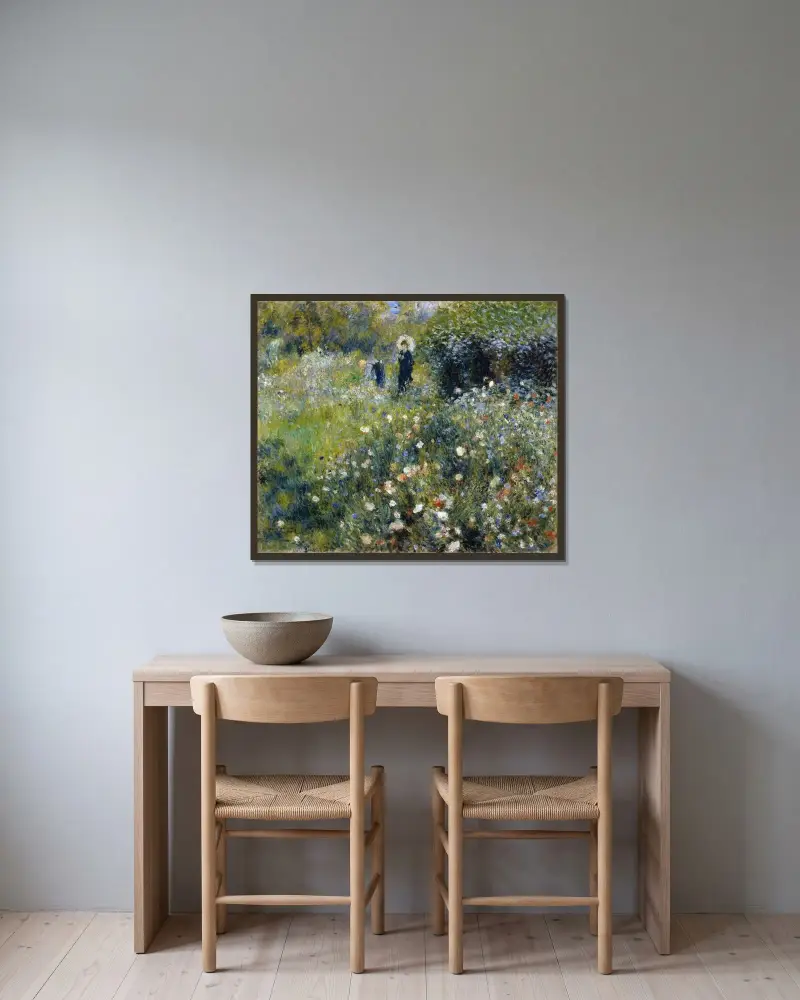 Kvinna med parasoll i en trädgård av Pierre-Auguste Renoir inramad på en vägg