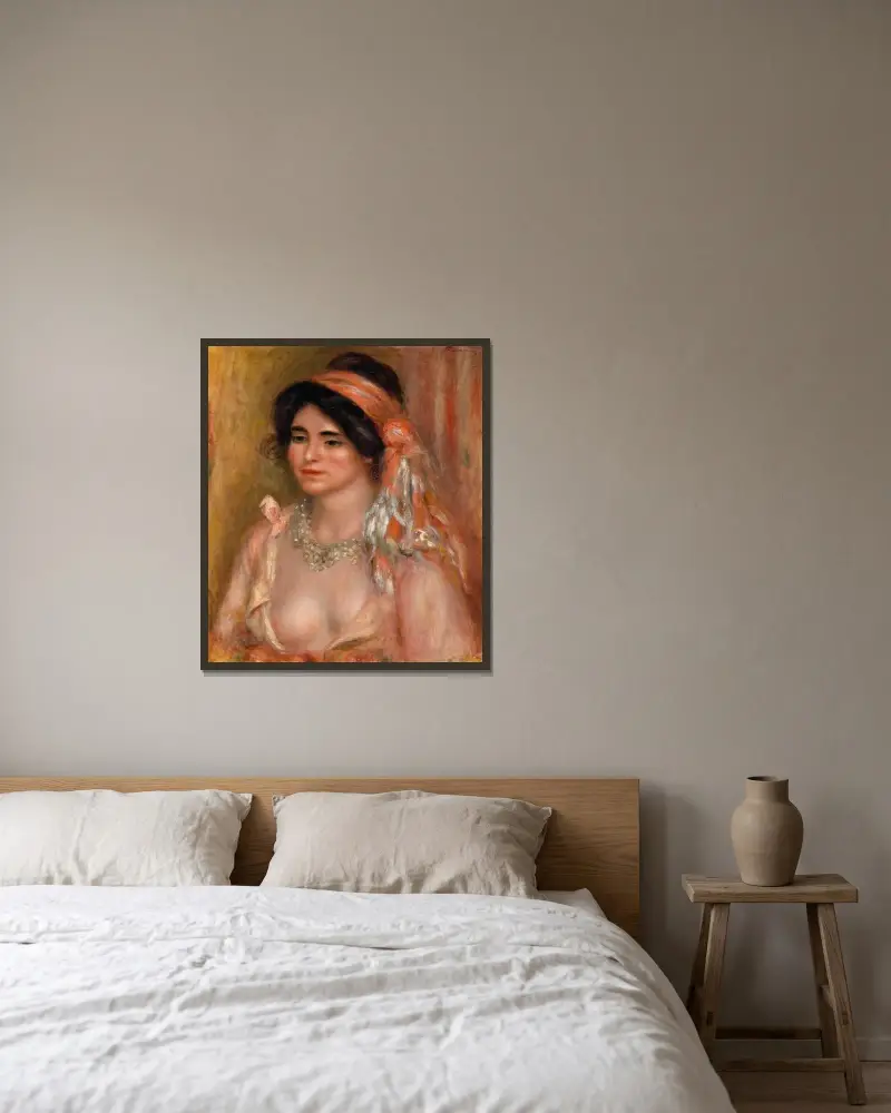 Kvinna med svart hår av Pierre-Auguste Renoir inramad på en vägg