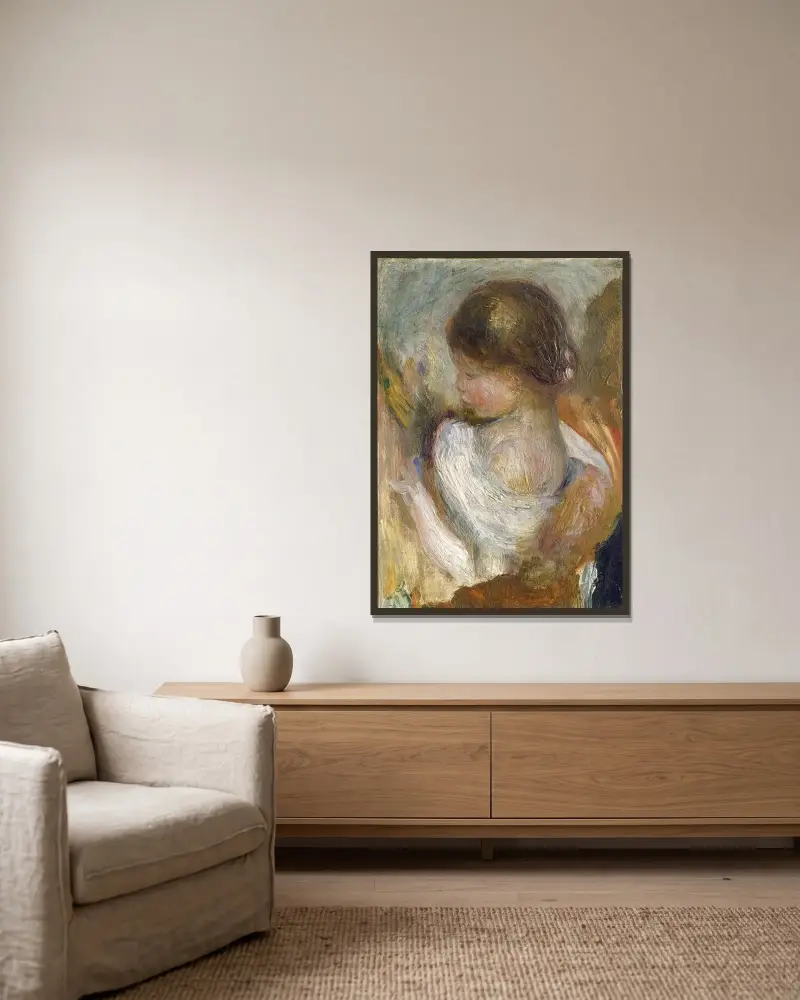 Lesendes Mädchen von Pierre-Auguste Renoir gerahmt an einer Wand
