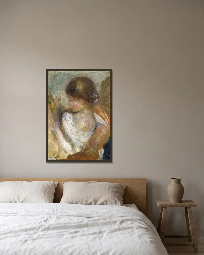 Lesendes Mädchen von Pierre-Auguste Renoir gerahmt an einer Wand