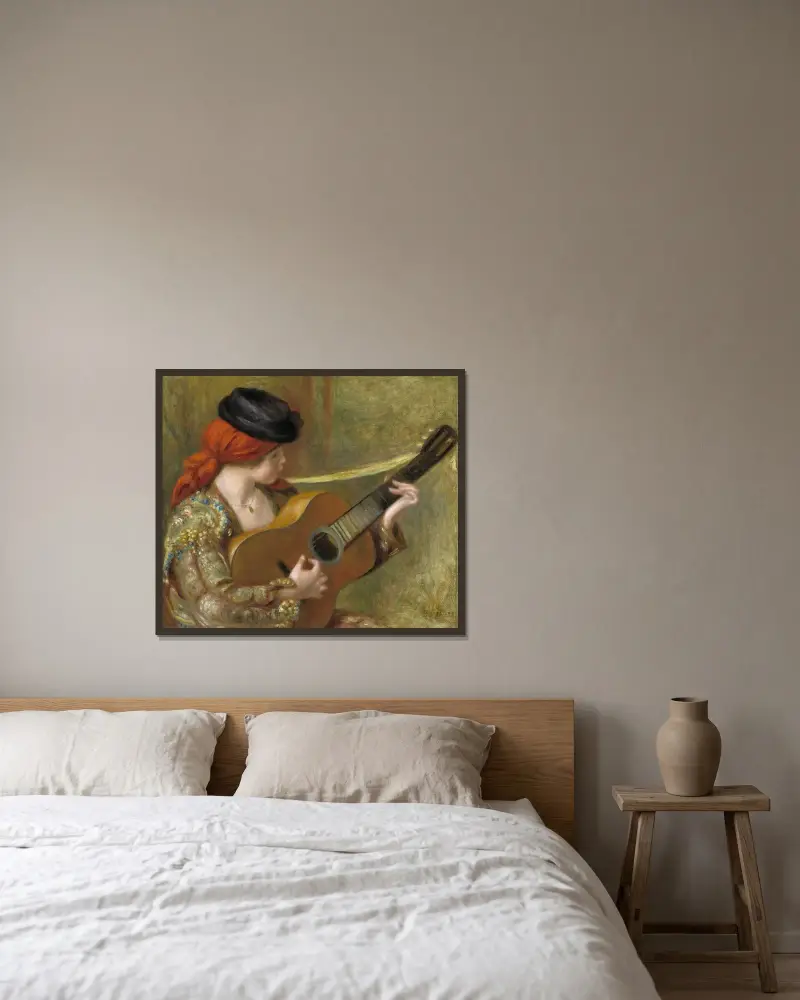 Ung spansk kvinna med gitarr av Pierre-Auguste Renoir inramad på en vägg