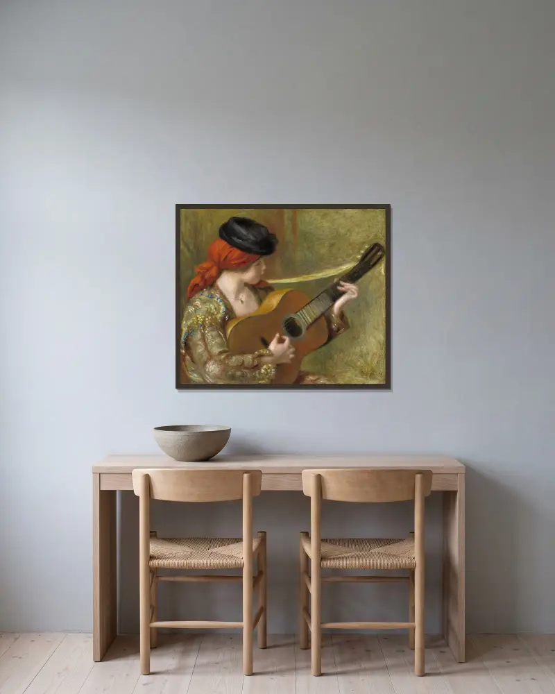 Ung spansk kvinna med gitarr av Pierre-Auguste Renoir inramad på en vägg