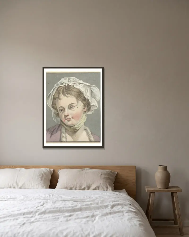 Flickhuvud av Jean-Baptiste Greuze inramad på en vägg