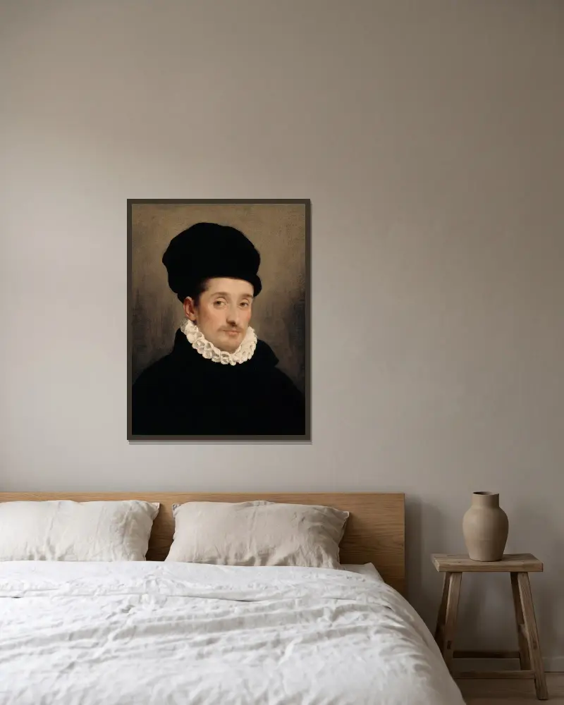 Bildnis eines Mannes – Nr. 1 von Giovanni Battista Moroni gerahmt an einer Wand