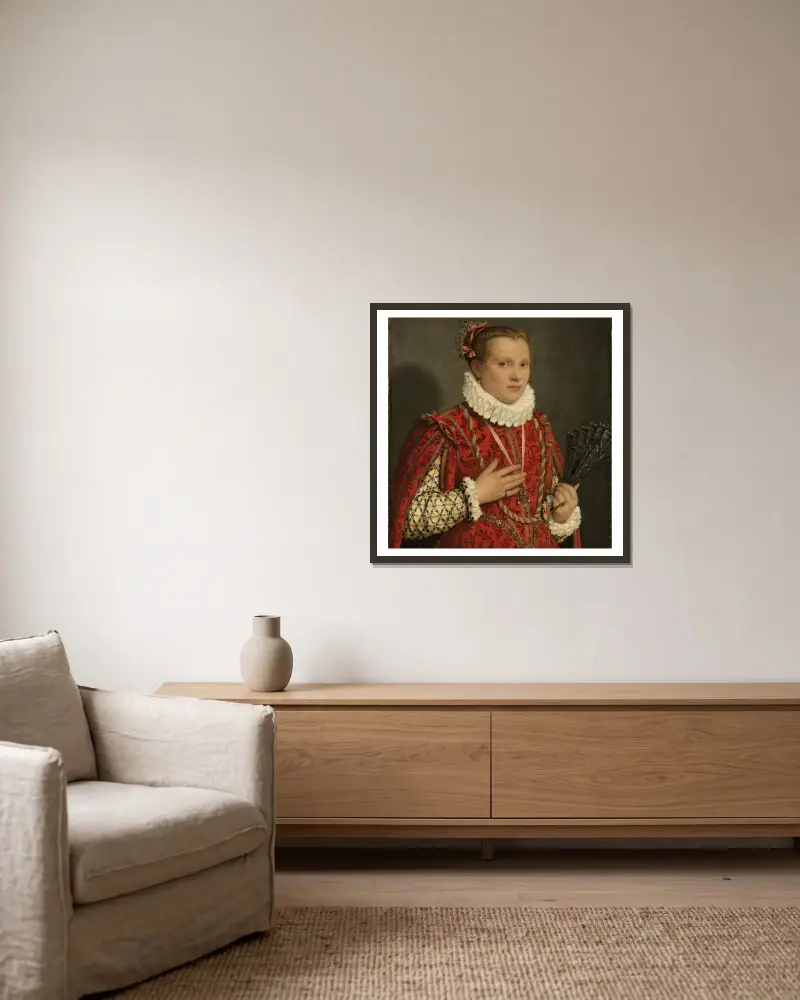 Porträtt av en ung kvinna av Giovanni Battista Moroni inramad på en vägg