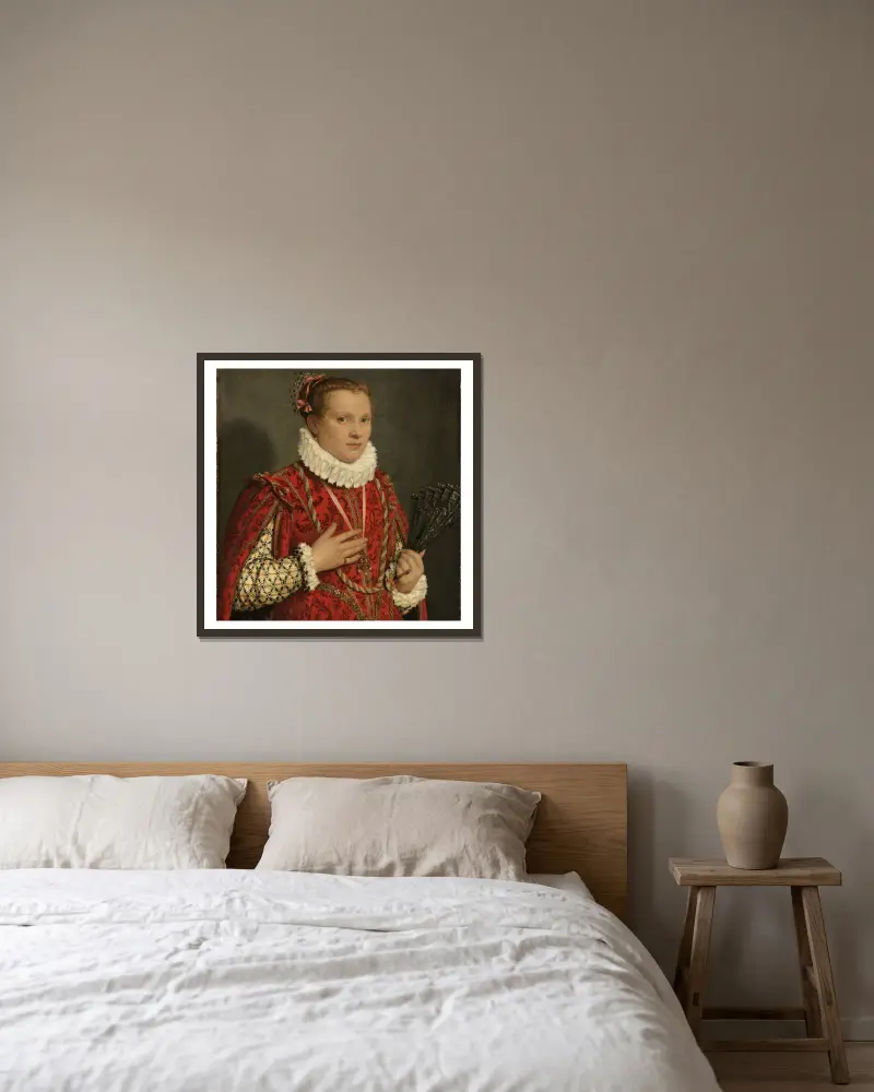 Porträtt av en ung kvinna av Giovanni Battista Moroni inramad på en vägg