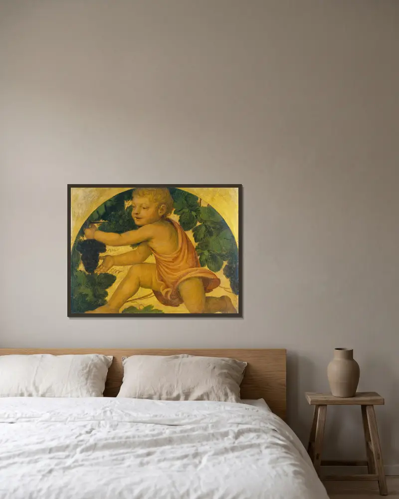 Putto picking Grapes av Bernardino Luini inramad på en vägg