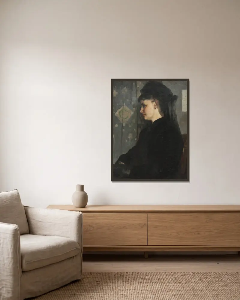 Woman in Black av Bertha Wegmann inramad på en vägg