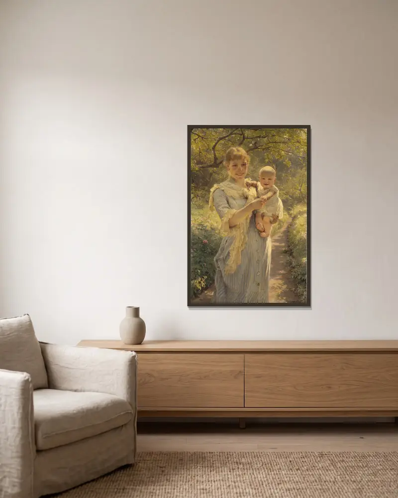 Ung mor med barn i trädgård av Bertha Wegmann inramad på en vägg