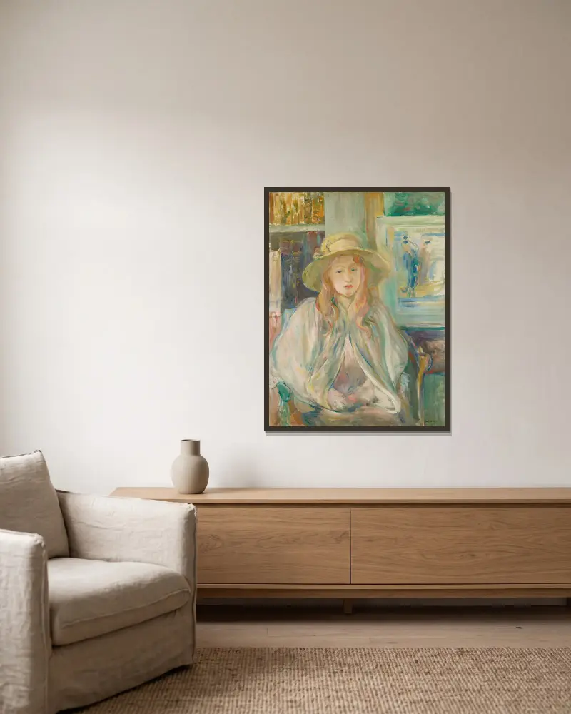 Flicka med halmhatt av Berthe Morisot inramad på en vägg