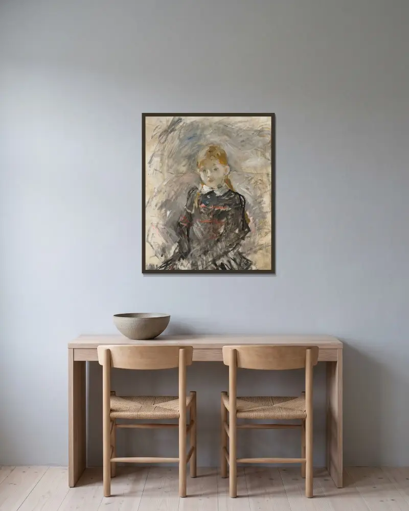 Liten flicka med blont hår av Berthe Morisot inramad på en vägg