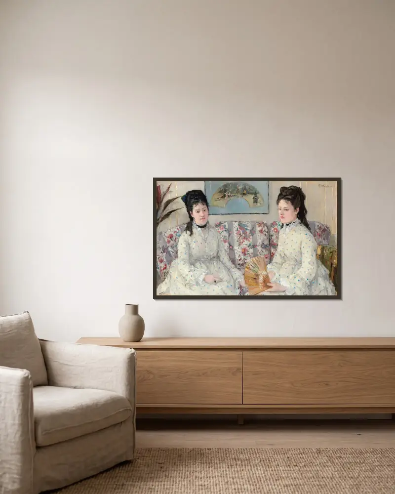 The Sisters av Berthe Morisot inramad på en vägg