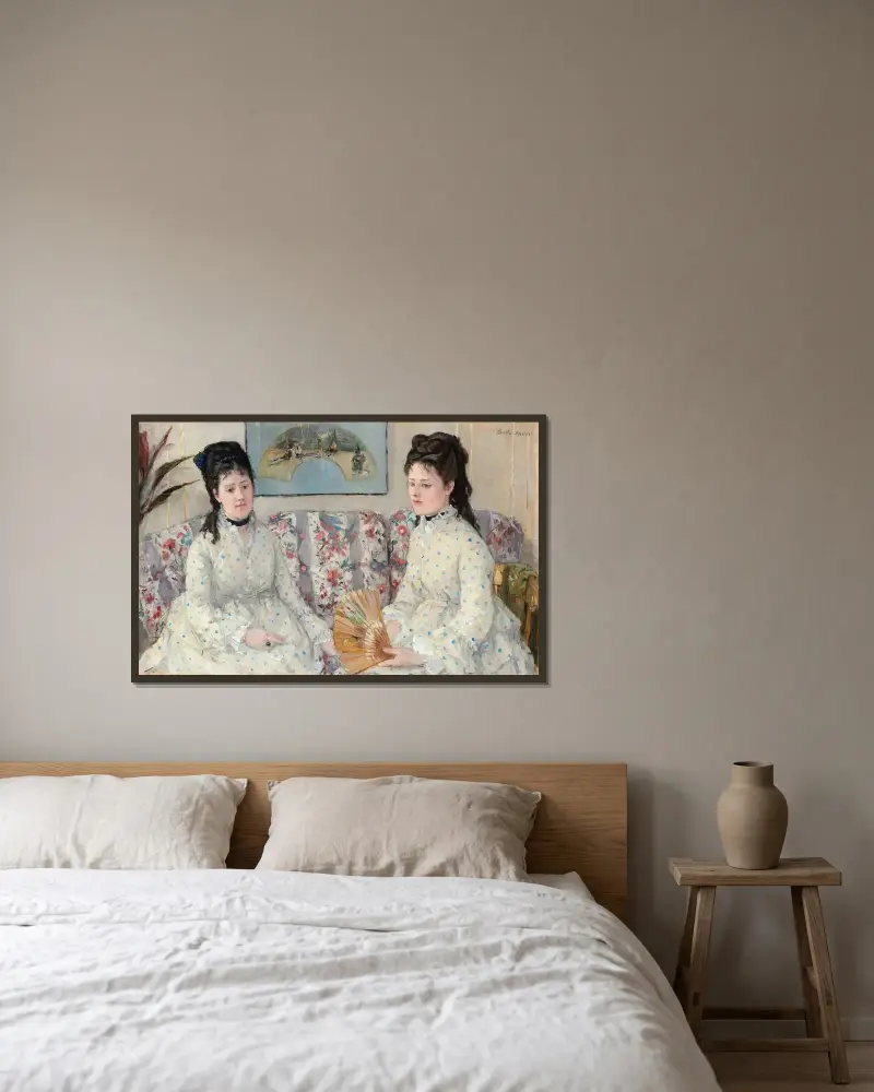 The Sisters av Berthe Morisot inramad på en vägg