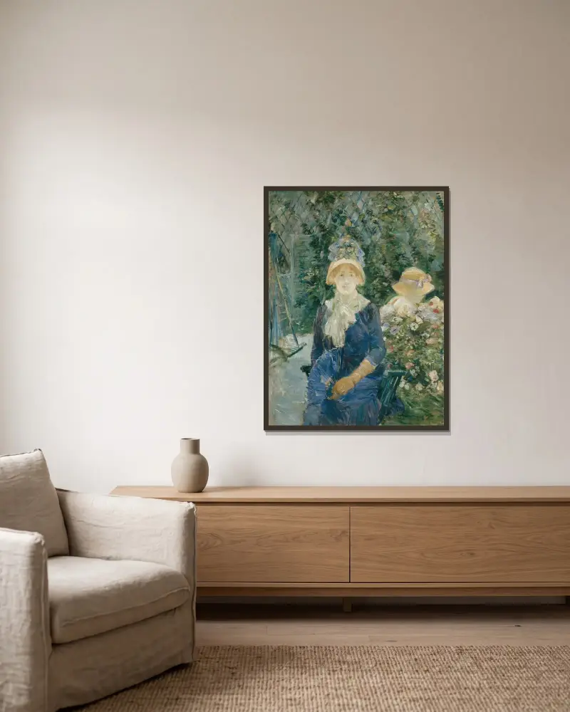 Kvinna i trädgård av Berthe Morisot inramad på en vägg