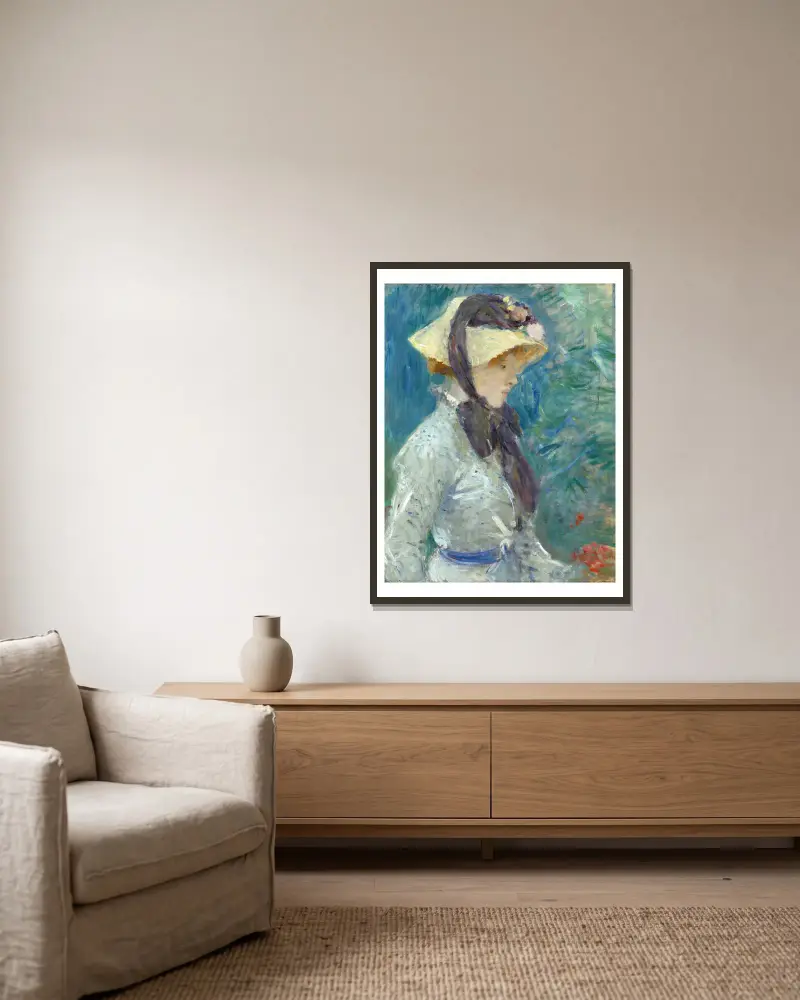 Junge Frau mit Strohhut von Berthe Morisot gerahmt an einer Wand
