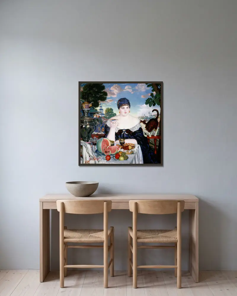 Köpmannafru vid tebordet av Boris Kustodiev inramad på en vägg