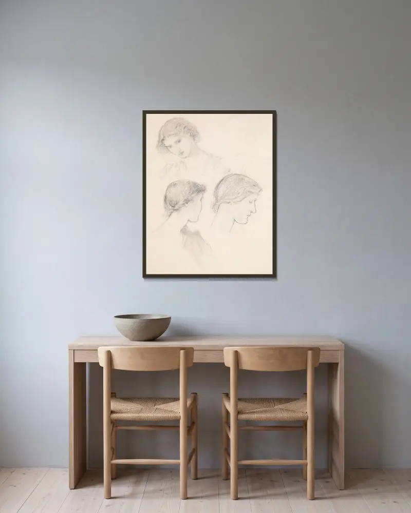 Huvudstudie av en flicka (tre studier) av Sir Edward Coley Burne-Jones inramad på en vägg