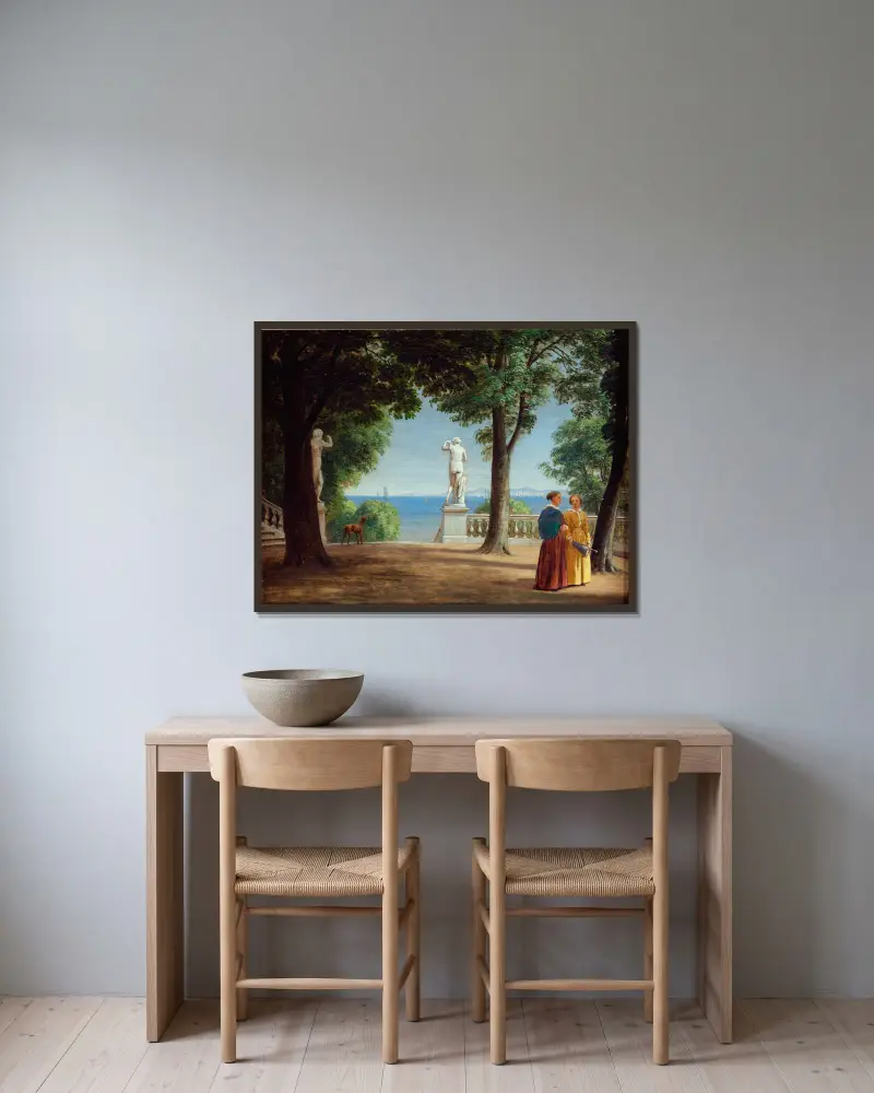 Utsikt mot Kullen från en trädgårdsterrass med statyer av P. C. Skovgaard inramad på en vägg