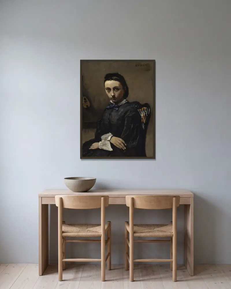 Porträtt av ung kvinna av Jean-Baptiste-Camille Corot inramad på en vägg