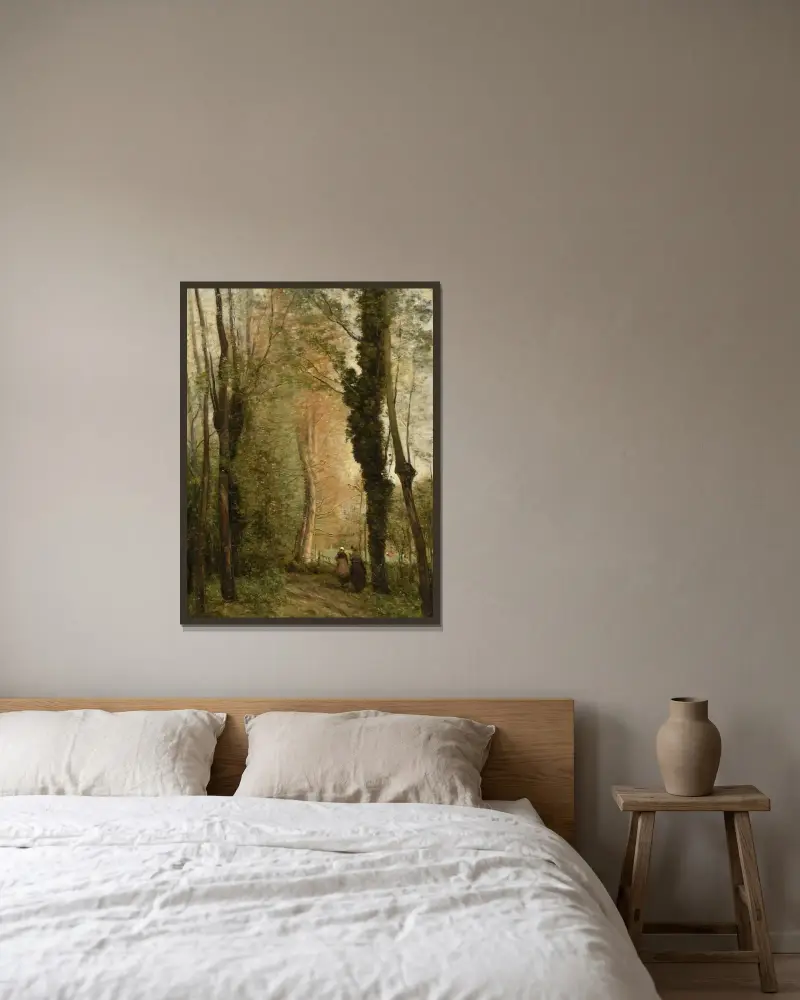 En väg under träden om våren av Jean-Baptiste-Camille Corot inramad på en vägg
