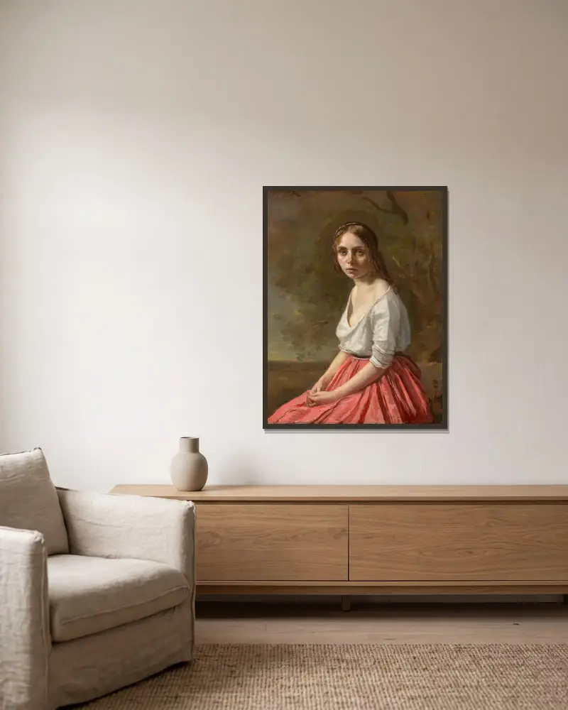 Ung kvinna i rosa kjol av Jean-Baptiste-Camille Corot inramad på en vägg