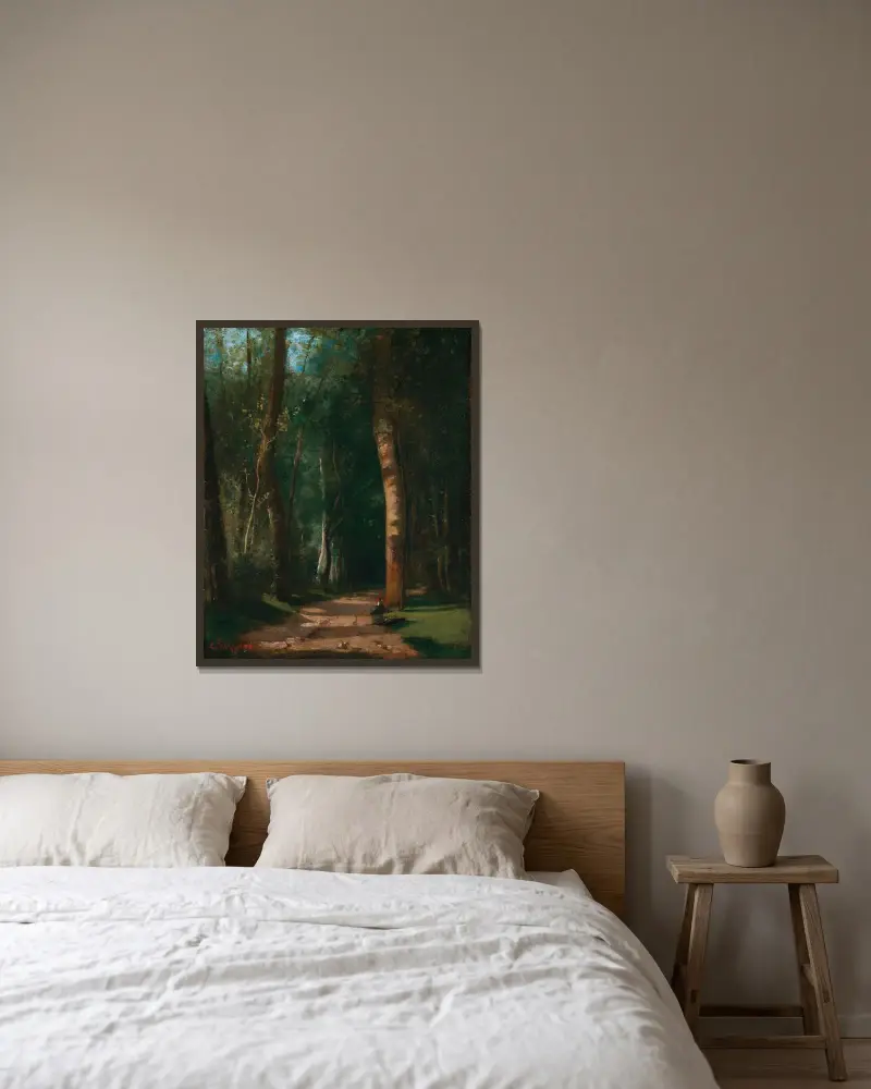 Allée Dans Une Fôret av Camille Pissarro inramad på en vägg